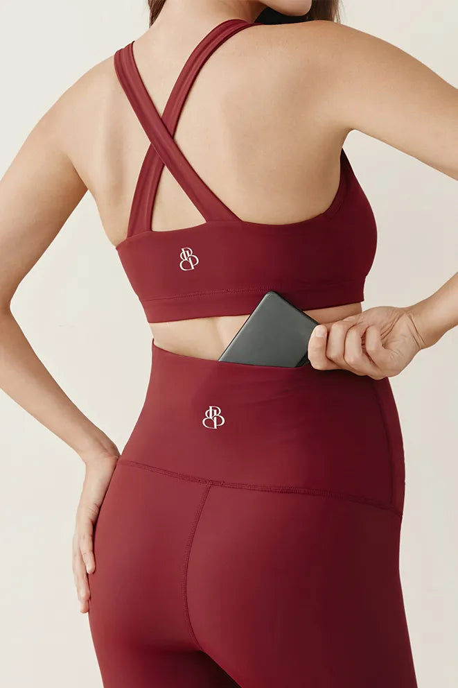 Burgundy maternity leggings designed for comfortable wear during pregnancy and postpartum