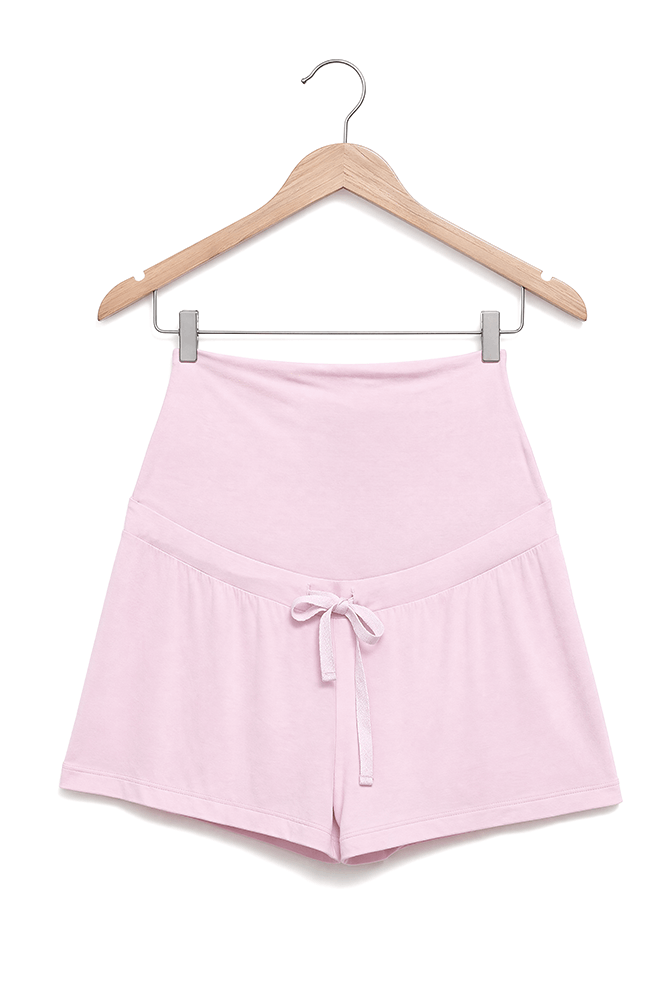 Pregnant woman wearing Forever Comfy Bamboo Shorts in Pink by Bonbump