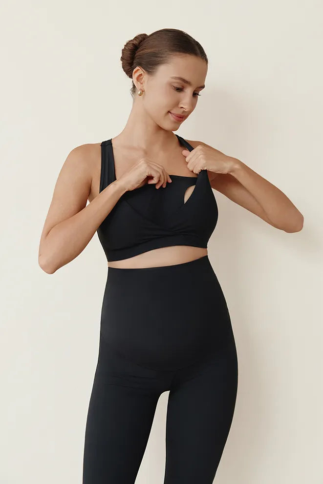Black maternity sports bra for prenatal yoga, walking, stretching, Pilates, and low-impact exercise