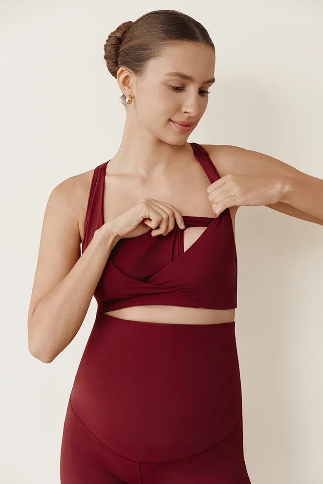 Burgundy maternity sports bra for prenatal yoga, stretching, walking, Pilates, and pregnancy-friendly exercise