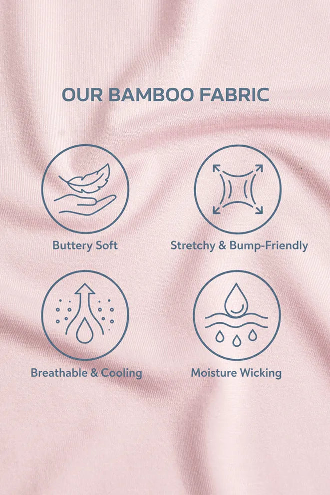 A close-up of light pink bamboo fabric with the headline 'OUR BAMBOO FABRIC' and four blue line icons and labels describing its properties: buttery soft, stretchy and bump-friendly, breathable and cooling, and moisture wicking.